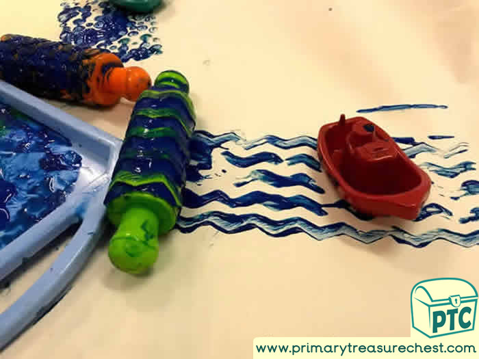 Painting waves for boat Tuff Tray for EYFS Children